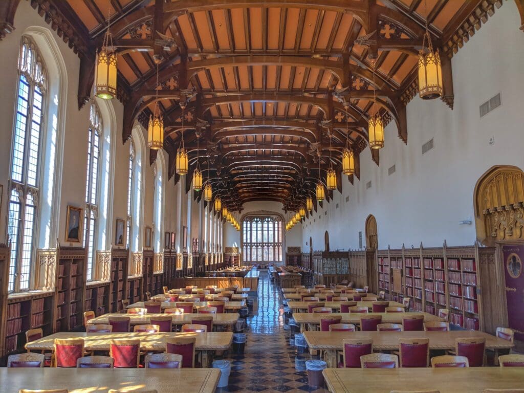 A university study hall with gothic church style architecture.